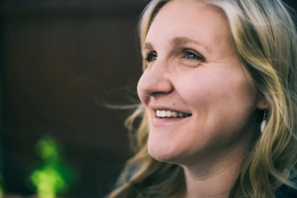 Life coach reviewing certification program costs