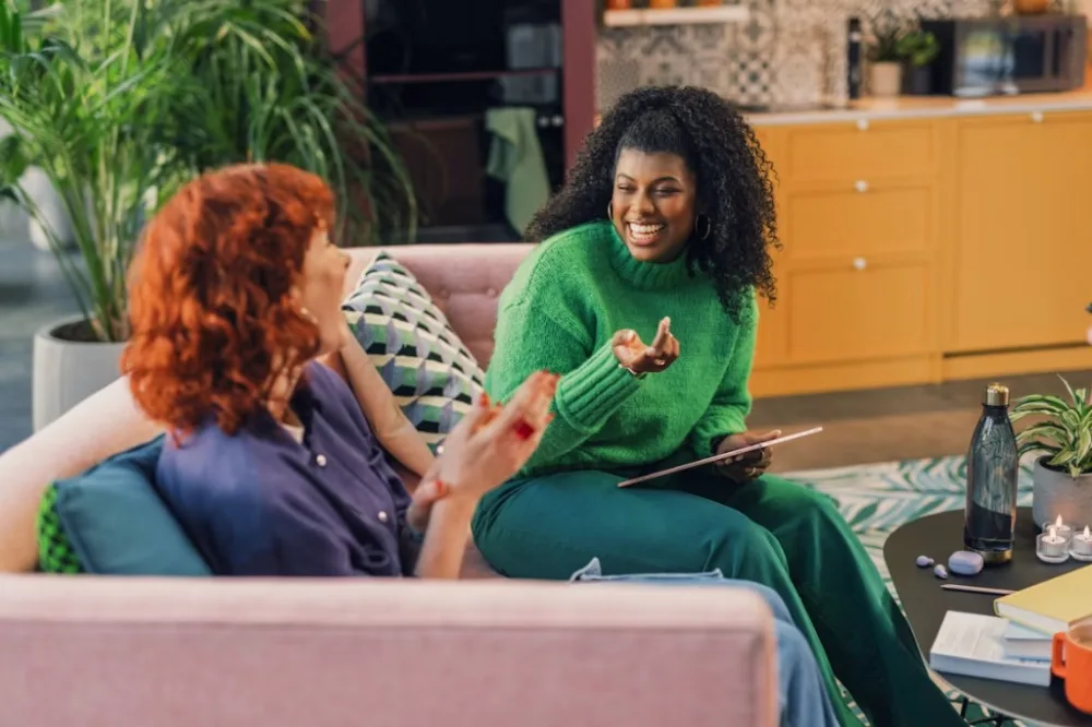 Woman coach smiling during an online coaching session